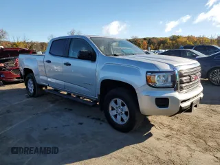 2015 GMC Canyon 2WD with VIN 1GTG5AE35F1143280, listed as a Copart auction lot 75846964 with 116,845 mi miles and Salvage Title. Bid and sale history available at DreamBid. Image 4.