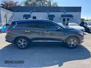 2020 Infiniti QX60 Luxe with VIN 5N1DL0MM9LC538281, listed as a Copart auction lot 56608075 with 130,337 mi miles and Non Repairable. Bid and sale history available at DreamBid. Image 14.