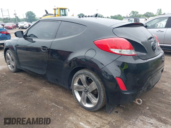 2013 Hyundai Veloster w/Black Int with VIN KMHTC6AD7DU170049, listed as a IAAI auction lot 42441737 with 101,924 mi miles and . Bid and sale history available at DreamBid. Image 3.