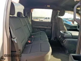 2023 Ford F-150 XL with VIN 1FTEW1CP0PKD18024, listed as a Copart auction lot 64282415 with 96,095 mi miles and Salvage title. Bid and sale history available at DreamBid. Image 10.