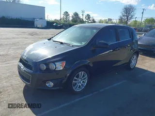 2014 Chevrolet Sonic LT with VIN 1G1JC6SB4E4151333, listed as a IAAI auction lot 41815985 with 112,123 mi miles. Bid and sale history available at carsss.com. Image 2.