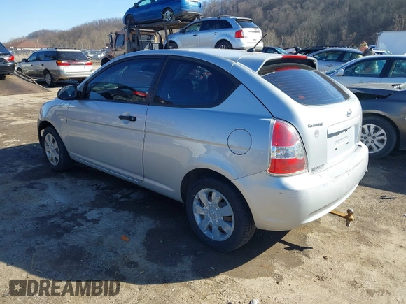 2007 Hyundai Accent GS with VIN KMHCM36C97U043769, listed as a IAAI auction lot 41526011 with 230,566 mi miles. Bid and sale history available at carsss.com. Image 3.