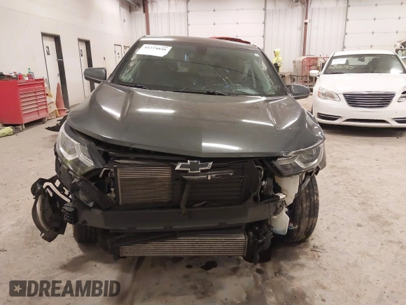 2019 Chevrolet Equinox LT with VIN 2GNAXKEV1K6157781, listed as a IAAI auction lot 41274846 with 128,425 mi miles and . Bid and sale history available at DreamBid. Image 12.