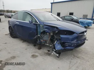 2020 Tesla Model X Long Range with VIN 5YJXCBE2XLF250234, listed as a Copart auction lot 42236365 with 63,401 mi miles and Non Repairable. Bid and sale history available at carsss.com. Image 4.