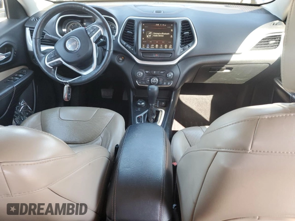 2016 Jeep Cherokee Limited with VIN 1C4PJMDB4GW188401, listed as a Copart auction lot 53507725 with 144,797 mi miles and Salvage Title. Bid and sale history available at DreamBid. Image 8.