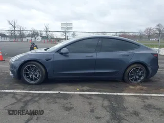2022 Tesla Model 3 Long Range with VIN 5YJ3E1EB9NF206943, listed as a IAAI auction lot 41911040 with 69,920 mi miles and . Bid and sale history available at DreamBid. Image 14.