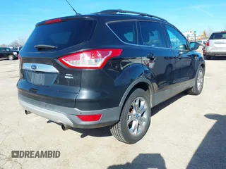 2013 Ford Escape SEL with VIN 1FMCU9HX1DUA20307, listed as a IAAI auction lot 41933873 with 164,962 mi miles. Bid and sale history available at carsss.com. Image 4.