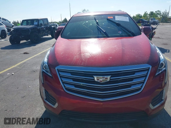 2019 Cadillac XT5 FWD with VIN 1GYKNARS9KZ173920, listed as a IAAI auction lot 42321141 with Not provided miles and . Bid and sale history available at DreamBid. Image 6.
