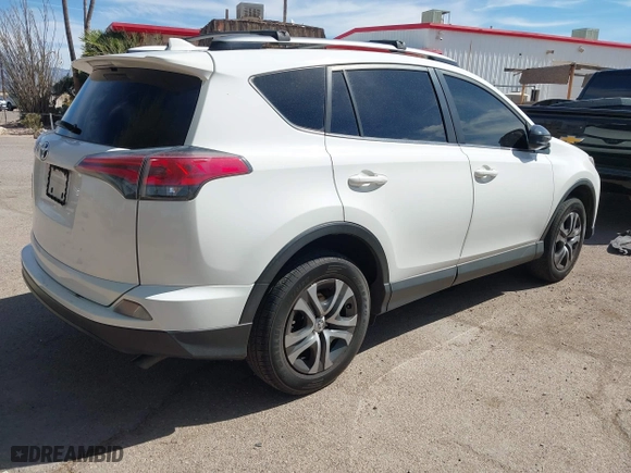 2017 Toyota RAV4 LE with VIN JTMZFREV0HJ116626, listed as a IAAI auction lot 41809294 with 110,114 mi miles. Bid and sale history available at carsss.com. Image 4.