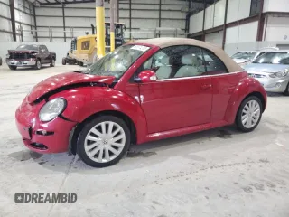 2009 Volkswagen Beetle S with VIN 3VWRF31Y59M401627, listed as a Copart auction lot 60874235 with 167,754 mi miles and Salvage title. Bid and sale history available at DreamBid. Image 1.