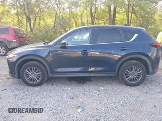 2017 Mazda CX-5 Touring with VIN JM3KFBCL6H0170455, listed as a IAAI auction lot 40381242 with 71,520 mi miles. Bid and sale history available at carsss.com. Image 14.