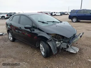 2017 Ford Fiesta SE with VIN 3FADP4BJ7HM137543, listed as a IAAI auction lot 41555369 with 141,780 mi miles. Bid and sale history available at carsss.com. Image 1.