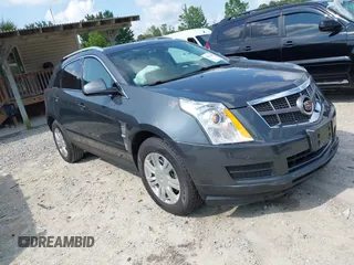 2012 Cadillac SRX Luxury Collection z VIN 3GYFNAE35CS641592, wystawiony jako IAAI lot #42382400 z przebiegiem 150 559 mil mil oraz . Historia ofert i sprzedaży dostępna na DreamBid. Obrazek 1.
