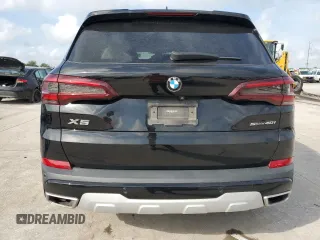 2021 BMW X5 sDrive40i z VIN 5UXCR4C00M9E01511, wystawiony jako Copart lot #54236305 z przebiegiem Nie podano mil oraz Szkoda całkowita • Salvage title. Historia ofert i sprzedaży dostępna na DreamBid. Obrazek 6.