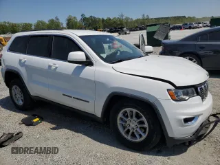 2019 Jeep Grand Cherokee Altitude with VIN 1C4RJEAG9KC662240, listed as a Copart auction lot 52871935 with 123,188 mi miles and Salvage title. Bid and sale history available at DreamBid. Image 4.