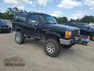 1990 Ford Bronco z VIN 1FMCU14T9LUA15536, wystawiony jako Copart lot #54391815 z przebiegiem 319 124 mil mil oraz Szkoda całkowita • Salvage title. Historia ofert i sprzedaży dostępna na DreamBid. Obrazek 4.