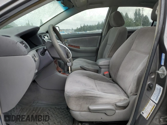 2005 Toyota Corolla CE with VIN 1NXBR32EX5Z407487, listed as a Copart auction lot 61650235 with 233,561 mi miles and Salvage title. Bid and sale history available at DreamBid. Image 7.