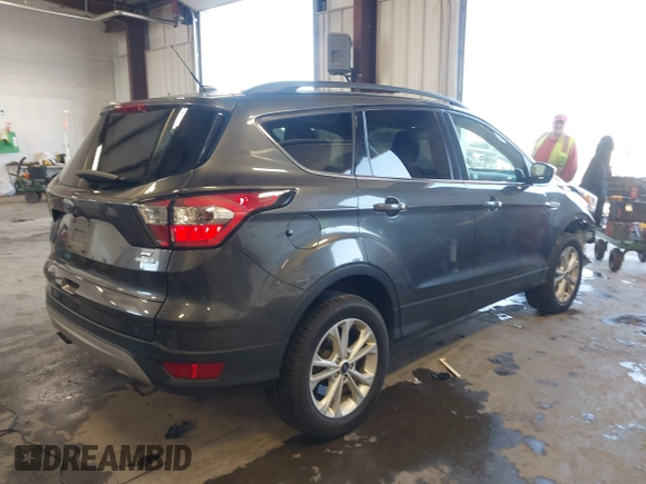 2018 Ford Escape SE with VIN 1FMCU9GD1JUC36452, listed as a IAAI auction lot 41964531 with 89,457 mi miles. Bid and sale history available at carsss.com. Image 4.