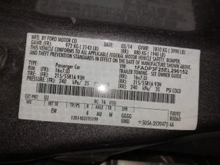 2014 Ford Focus SE with VIN 1FADP3F25EL296152, listed as a IAAI auction lot 40692477 with 197,566 mi miles. Bid and sale history available at carsss.com. Image 9.