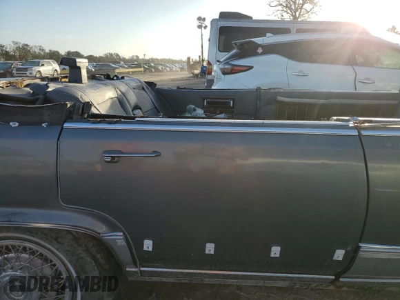 1990 Cadillac Brougham z VIN 1G6DW5472LR711206, wystawiony jako Copart lot #75627814 z przebiegiem Nie podano mil oraz Nie do naprawy. Historia ofert i sprzedaży dostępna na DreamBid. Obrazek 10.