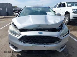 2015 Ford Focus SE with VIN 1FADP3F24FL203509, listed as a IAAI auction lot 41765582 with 139,856 mi miles. Bid and sale history available at carsss.com. Image 6.