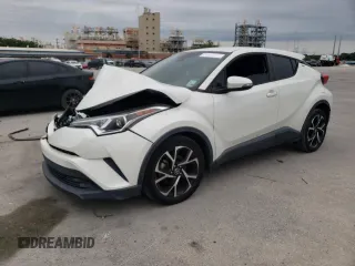 2018 Toyota C-HR XLE z VIN NMTKHMBX9JR008968, wystawiony jako Copart lot #57532305 z przebiegiem 82 934 mil mil oraz Czysty tytuł • Clean title. Historia ofert i sprzedaży dostępna na DreamBid. Obrazek 1.