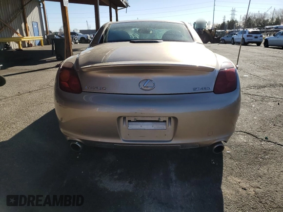 2002 Lexus SC 430 z VIN JTHFN48Y520005046, wystawiony jako Copart lot #49508605 z przebiegiem 126 933 mil mil oraz Szkody całkowita. Historia ofert i sprzedaży dostępna na DreamBid. Obrazek 6.