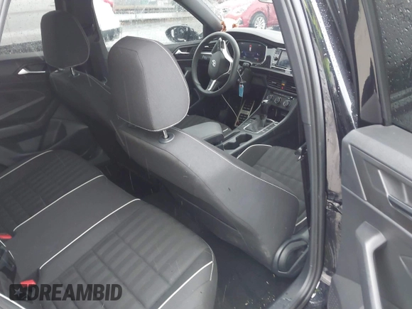 2023 Volkswagen Jetta Sport z VIN 3VWBM7BU2PM028974, wystawiony jako IAAI lot #41547698 z przebiegiem 30 061 mil mil oraz . Historia ofert i sprzedaży dostępna na DreamBid. Obrazek 8.