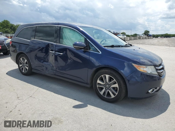 2014 Honda Odyssey Touring with VIN 5FNRL5H95EB044504, listed as a Copart auction lot 59228035 with 259,035 mi miles and Clean title. Bid and sale history available at DreamBid. Image 4.