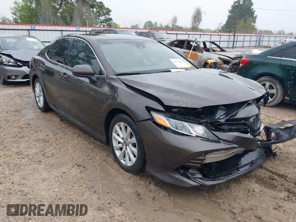 2020 Toyota Camry LE with VIN 4T1C11AK1LU320677, listed as a IAAI auction lot 41914421 with 94,291 mi miles. Bid and sale history available at carsss.com. Image 1.