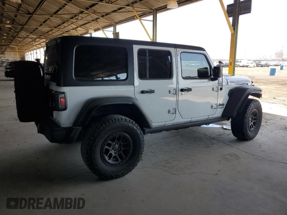 2021 Jeep Wrangler Unlimited Rubicon z VIN 1C4JJXFG5MW767036, wystawiony jako Copart lot #56918355 z przebiegiem 52 994 mil mil oraz Szkoda całkowita • Salvage title. Historia ofert i sprzedaży dostępna na DreamBid. Obrazek 3.