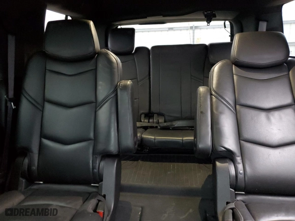 2016 Cadillac Escalade Platinum with VIN 1GYS4DKJ3GR354153, listed as a Copart auction lot 82494394 with 124,561 mi miles and Salvage Title. Bid and sale history available at carsss.com. Image 10.