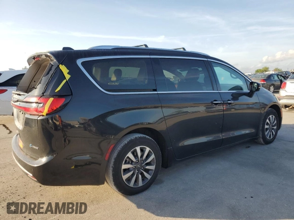 2021 Chrysler Pacifica Hybrid Touring L with VIN 2C4RC1L76MR578340, listed as a Copart auction lot 54748445 with 137,390 mi miles and Salvage title. Bid and sale history available at DreamBid. Image 3.
