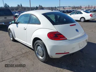 2012 Volkswagen Beetle 2.5L PZEV with VIN 3VWHP7AT6CM622309, listed as a IAAI auction lot 41681789 with 135,155 mi miles. Bid and sale history available at carsss.com. Image 3.