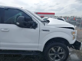 2015 Ford F-150 XLT with VIN 1FTEW1EF6FFC84666, listed as a IAAI auction lot 41895805 with 147,555 mi miles. Bid and sale history available at carsss.com. Image 21.