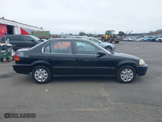 1998 Honda Civic LX with VIN JHMEJ6675WS002154, listed as a IAAI auction lot 41836717 with 150,025 mi miles. Bid and sale history available at carsss.com. Image 13.