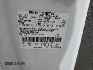 2010 Ford F-150 XL with VIN 1FTMF1CW2AKE74396, listed as a Copart auction lot 55518535 with 200,140 mi miles and Salvage title. Bid and sale history available at DreamBid. Image 13.