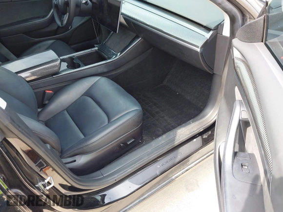 2023 Tesla Model 3 z VIN 5YJ3E1EA5PF484040, wystawiony jako IAAI lot #42128327 z przebiegiem 51 210 mil mil oraz . Historia ofert i sprzedaży dostępna na DreamBid. Obrazek 5.