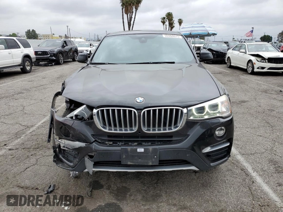 2018 BMW X4 xDrive28i with VIN 5UXXW3C57J0T82047, listed as a Copart auction lot 55988675 with 103,692 mi miles and Salvage title. Bid and sale history available at DreamBid. Image 5.