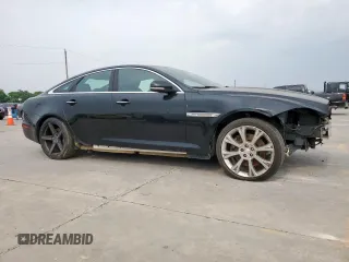 2015 Jaguar XJ with VIN SAJWA1CZ8F8V85381, listed as a Copart auction lot 57464225 with 161,938 mi miles and Salvage Title. Bid and sale history available at DreamBid. Image 4.
