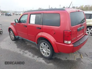 2011 Dodge Nitro Heat with VIN 1D4PT4GK0BW604140, listed as a IAAI auction lot 41208317 with 154,895 mi miles and . Bid and sale history available at DreamBid. Image 3.