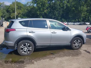 2018 Toyota RAV4 LE with VIN JTMZFREV3JJ161811, listed as a IAAI auction lot 40131640 with 114,330 mi miles. Bid and sale history available at carsss.com. Image 13.