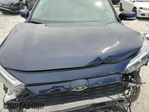 2023 Toyota RAV4 XLE Premium with VIN 2T3A1RFV2PW399766, listed as a Copart auction lot 54129895 with 18,238 mi miles and Salvage title. Bid and sale history available at DreamBid. Image 12.