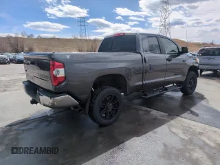 2017 Toyota Tundra SR z VIN 5TFUW5F19HX656990, wystawiony jako Copart lot #51087865 z przebiegiem 123 481 mil mil oraz Szkoda całkowita • Salvage title. Historia ofert i sprzedaży dostępna na DreamBid. Obrazek 3.