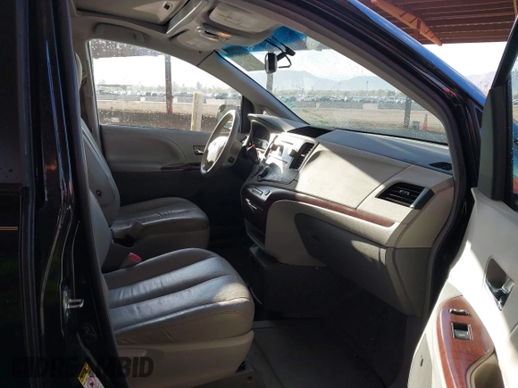 2012 Toyota Sienna XLE AAS with VIN 5TDYK3DC6CS263128, listed as a IAAI auction lot 41583798 with 114,820 mi miles. Bid and sale history available at carsss.com. Image 5.