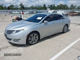 2015 Lincoln MKZ z VIN 3LN6L2GK5FR622117, wystawiony jako IAAI lot #42164455 z przebiegiem 167 156 mil mil oraz . Historia ofert i sprzedaży dostępna na DreamBid. Obrazek 2.