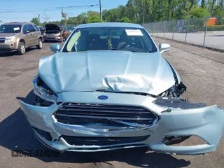 2014 Ford Fusion SE Hybrid with VIN 3FA6P0LU3ER373311, listed as a IAAI auction lot 42048513 with 155,935 mi miles. Bid and sale history available at carsss.com. Image 12.