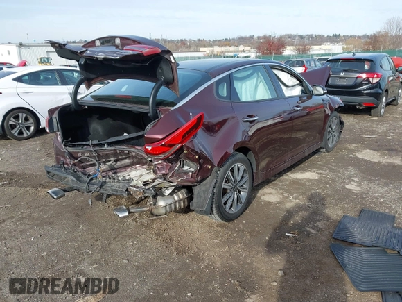 2019 Kia Optima EX with VIN 5XXGU4L11KG313557, listed as a IAAI auction lot 40973008 with 66,269 mi miles. Bid and sale history available at carsss.com. Image 4.
