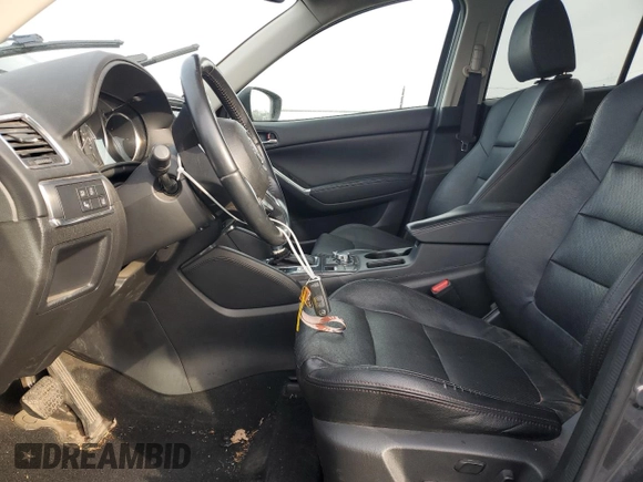 2016 Mazda CX-5 Grand Touring with VIN JM3KE4DY0G0876540, listed as a Copart auction lot 42132815 with 110,158 mi miles and Salvage Title. Bid and sale history available at DreamBid. Image 7.