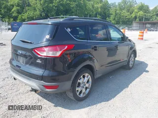 2013 Ford Escape SE z VIN 1FMCU9GX5DUA19887, wystawiony jako IAAI lot #42580986 z przebiegiem 169 407 mil mil oraz . Historia ofert i sprzedaży dostępna na DreamBid. Obrazek 4.